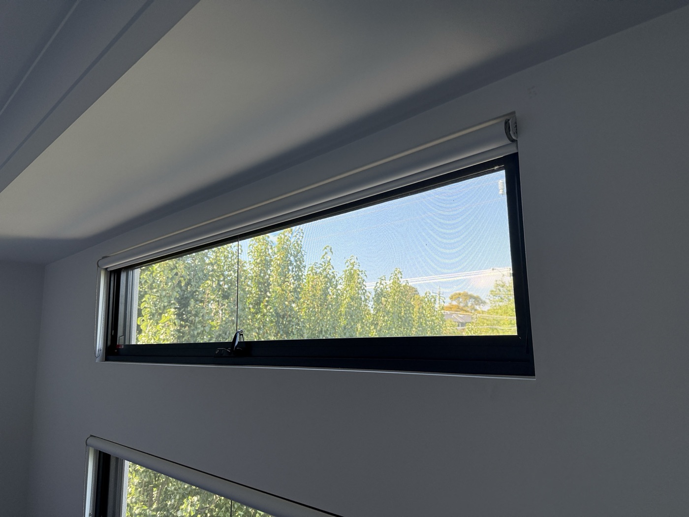 New black-framed window by JT in Brighton East