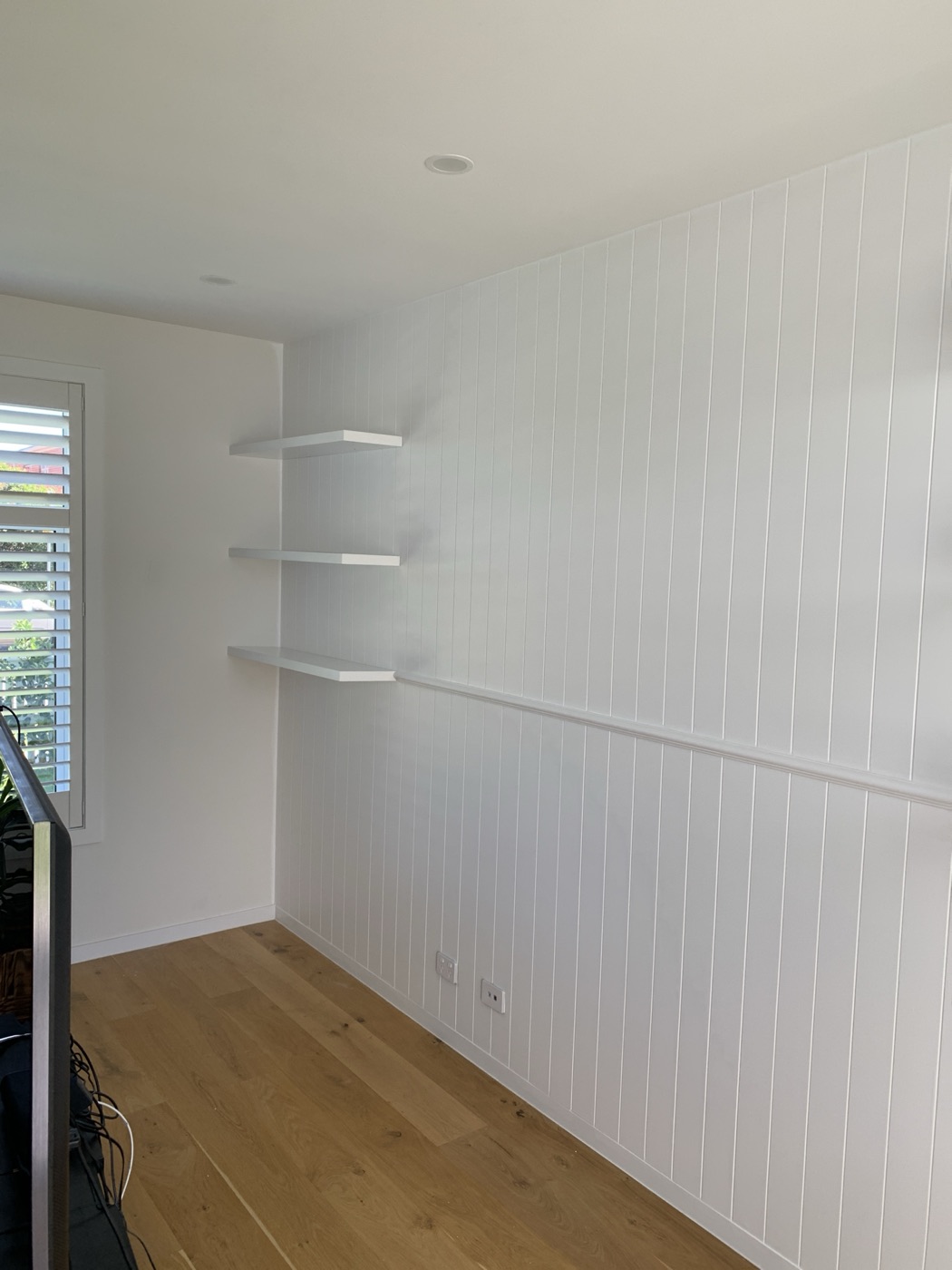 VJ panelling with floating shelves by JT in Pascoe Vale